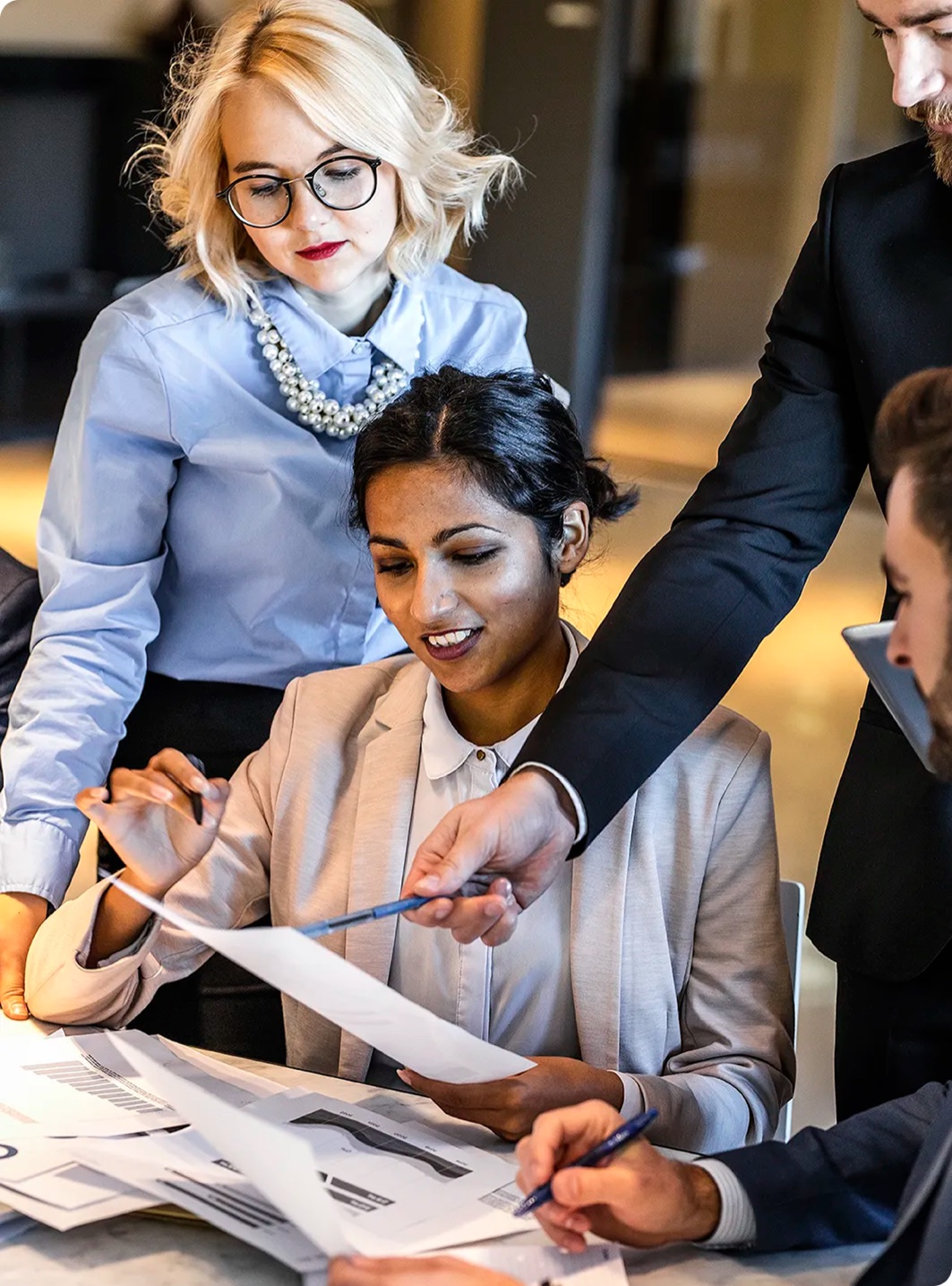 A group of finance professionals in a training session